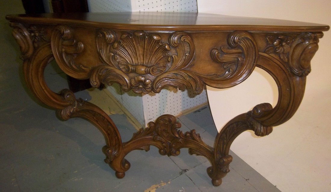 Art Nouveau carved walnut corner pier table: 19th C. Art Nouveau detail carved walnut corner pier table 45"hx39"wx43 1/2"d Auction Estimate $400-800