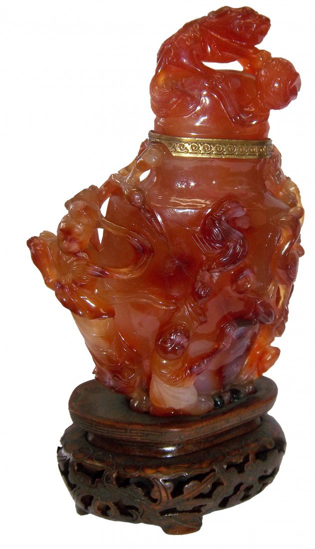 19th C. Carnelian bottle with teakwood base: 19th C. Carnelian bottle with teakwood base 6 1/2"h x 4"w Auction Estimate 400-800