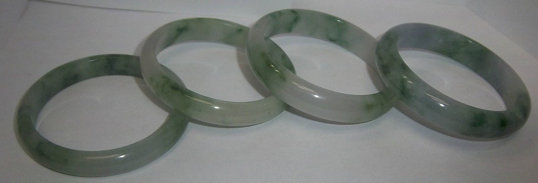 2 Pairs of Jade bangles: 2 Pairs of Jade bangles Auction Estimate 200-300