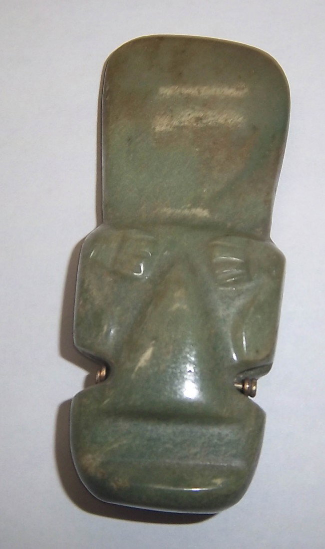Oriental jade totem head: Oriental jade totem head 2 1/2"h Auction Estimate 200-400