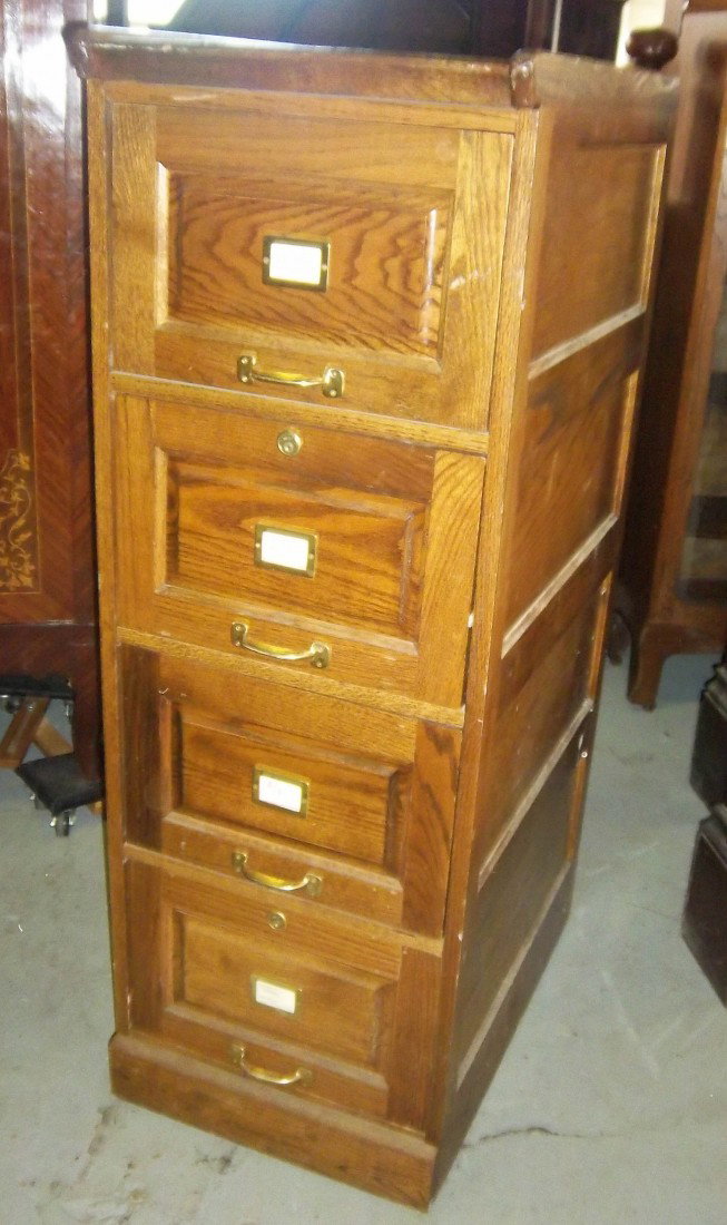 Quartersawn oak legal size file cabinet: Quartersawn oak legal size file cabinet 53 1/2"h Auction Estimate 200-400