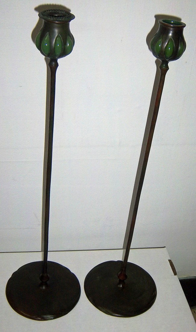 Pr. Tiffany Studios candelsticks: Pr of Tiffany Studios candlesticks, bronze with its original patina with inset green glass 21"h Auction Estimate 2250-3500