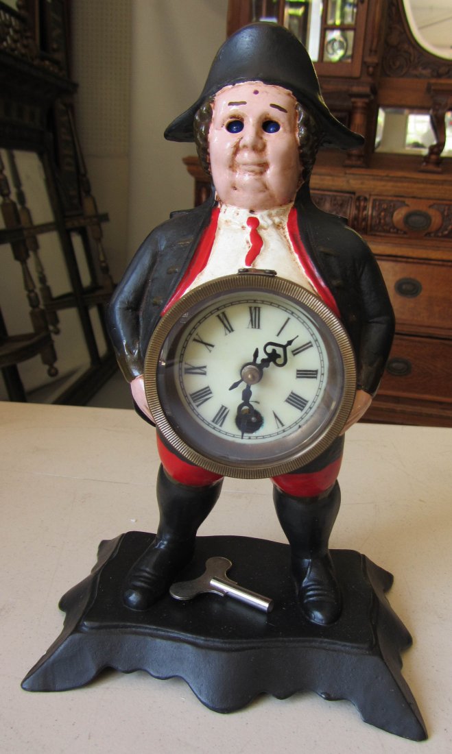 Iron man clock with blinking eyes: Iron man clock with blinking eyes 10"h Auction Estimate 50-150
