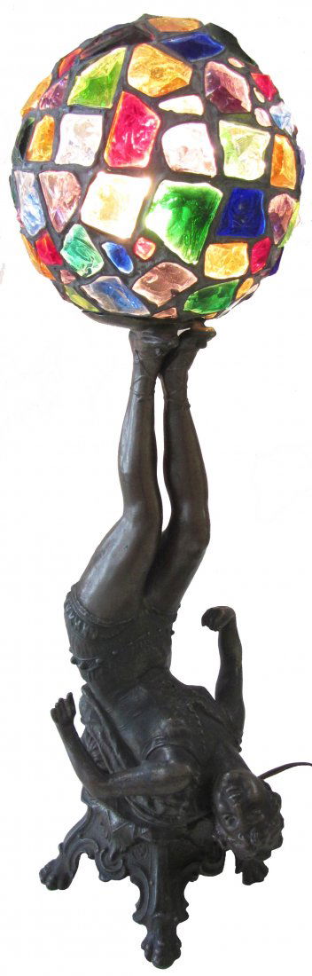 Rare American Art Deco dancer lamp: Rare American Art Deco dancer lamp with chunk glass shade 24"h Auction Estimate 400-800