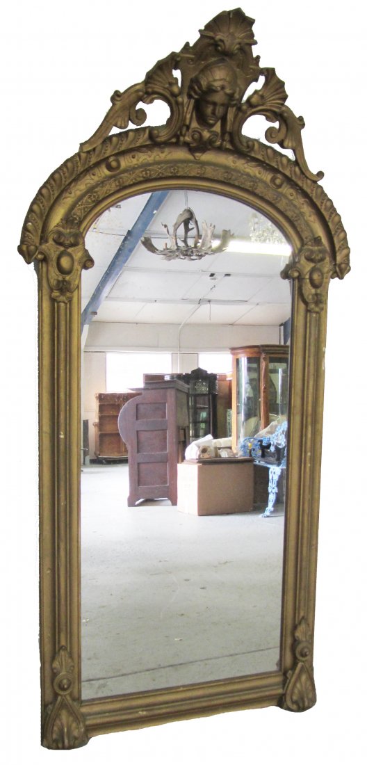 19th C. American Renaissance gilt mirror: 19th C. American Renaissance gilt mirror with Jenny Lind head 60 x 30 Auction Estimate 200-400