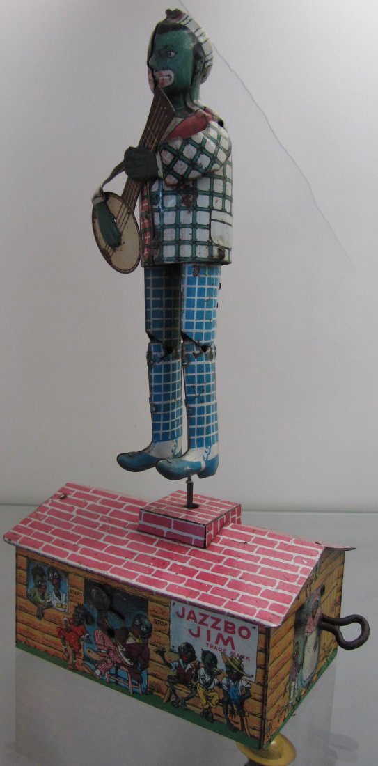 Strauss Jazzbo Jim Lithographed Jigger toy: Strauss Jazzbo Jim Lithographed Jigger toy 10 1/2 Auction Estimate 300-600