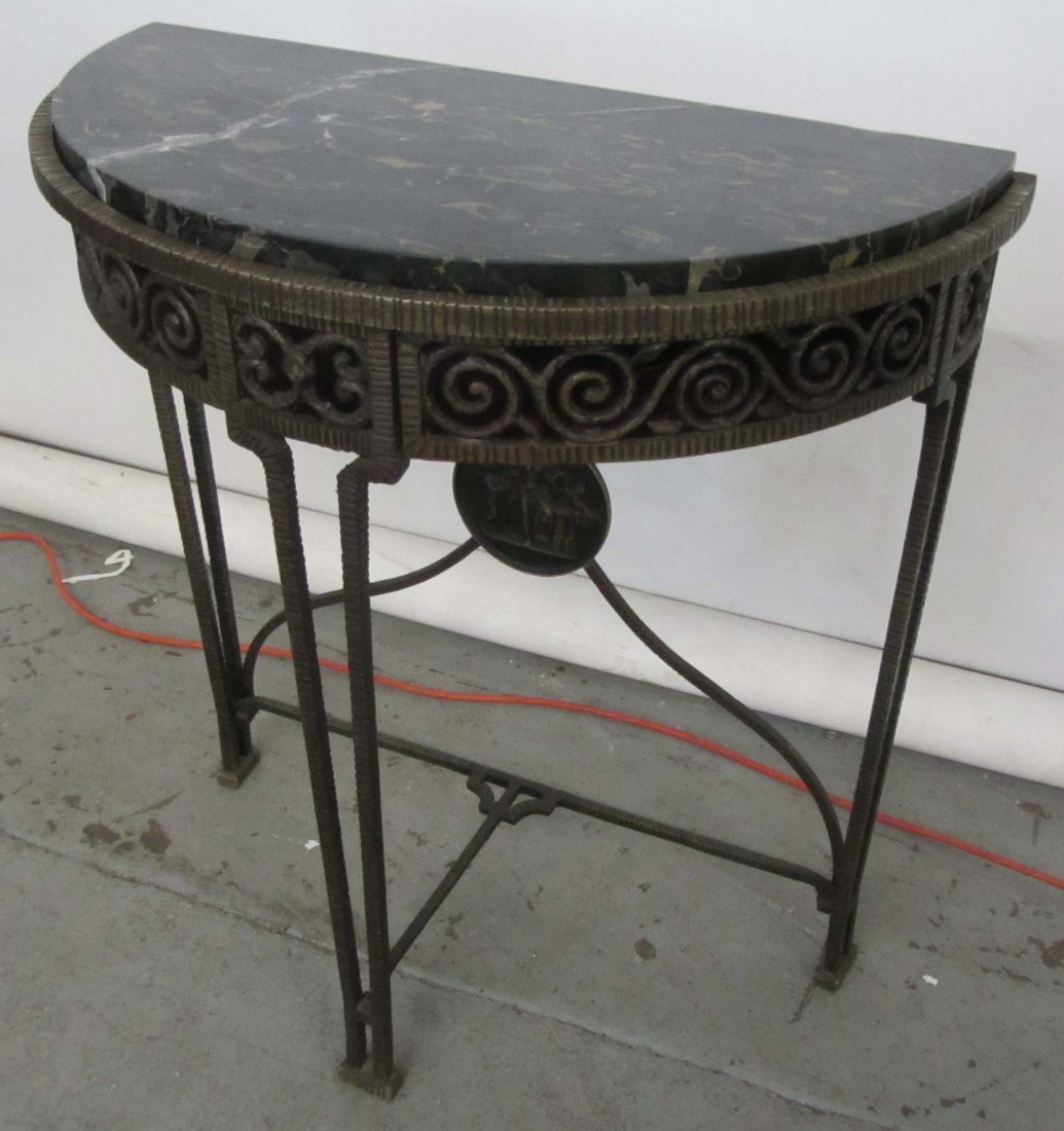 C1900 Iron demilune marbletop console: C1900 Iron Oscar Bach style demilune marbletop console 30 x 28 x 15 Auction Estimate 300-600
