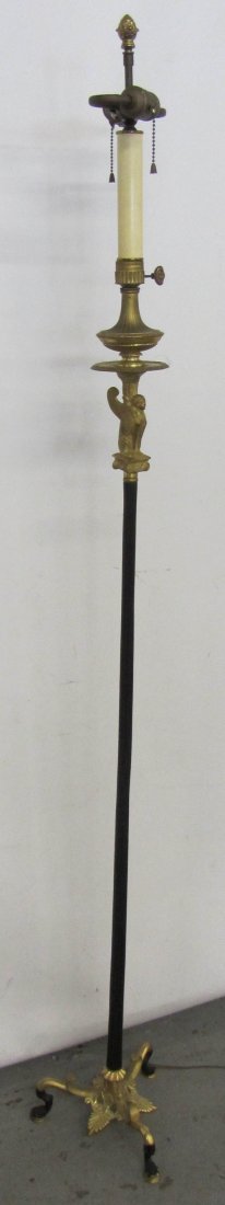 19th C. Dore and patinaed bronze floor lamp base: 19th C. Dore and patinaed bronze floor lamp base with winged griffin 64"h Auction Estimate 300-600