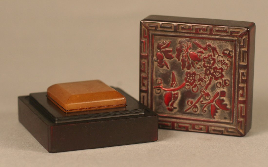 Chinese yellow soapstone seal with lacquered box: Chinese yellow soapstone seal with lacquered box decorated with flower design Auction Estimate 500-800