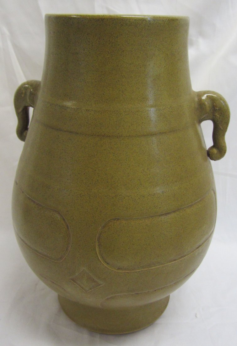 Chinese green glaze Zun vase: Chinese green glaze Zun vase with two handles and Qianlong mark on base 14 1/2 Auction Estimate 600-800