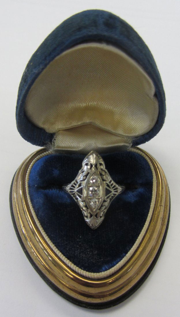 Art Deco 18K White gold filigree diamond ring: Antique Art Deco 18K White gold filigree diamond ring with blue sapphire stones Auction Estimate 750-1500