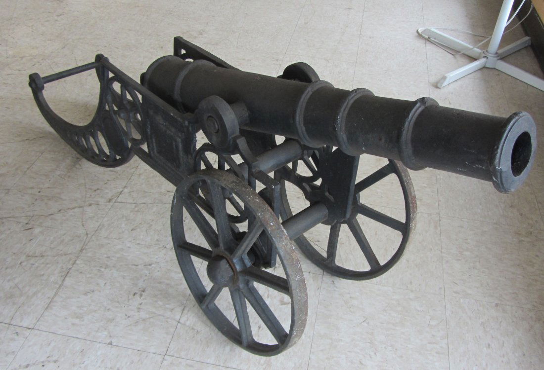 20th C. Large size cast iron cannon: 20th C. Large size cast iron cannon 27"h x 62"l Auction Estimate 300-600