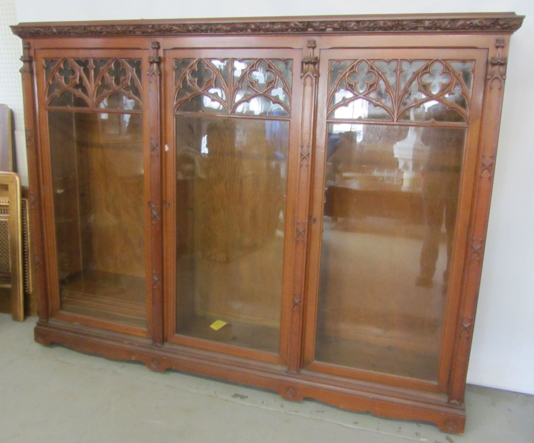 American Quartersawn oak Gothic 3 door bookcase: 19th C. American Quartersawn oak Gothic 3 door bookcase by RJ Horner 62 x 82 x 15 Auction Estimate 1750-3500