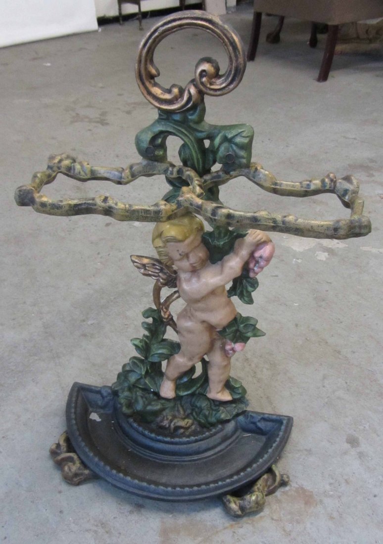 20th C. Cast iron umbrella rack: 20th C. Cast iron umbrella rack 26 x 18 Auction Estimate 150-300