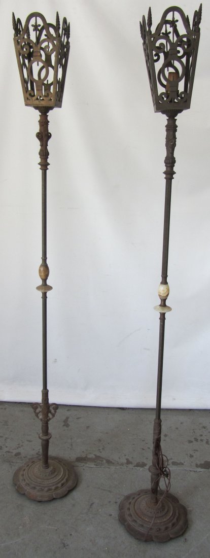 Pr. C1900 Cast bronze iron and onyx torchieres: Pr. C1900 Cast bronze iron and onyx torchieres by Oscar Bach 68"h Auction Estimate 300-600