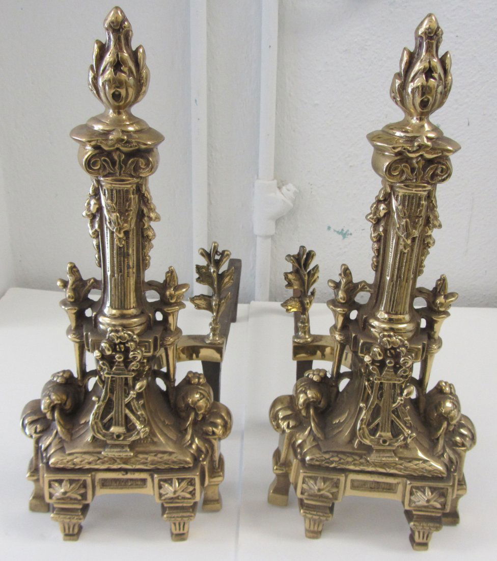 Pr. 19th C. Bronze andirons with flame tops: Pr. 19th C. Bronze andirons with flame tops 17 1/2"h Auction Estimate 100-300