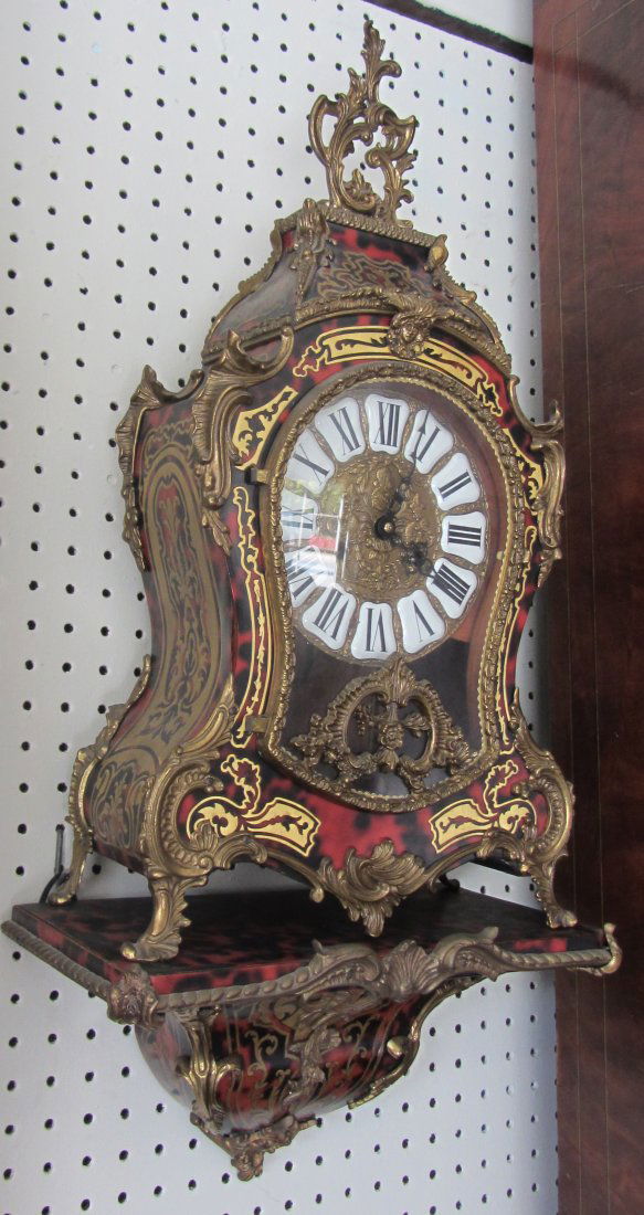 C1900 2 Piece Boulle wall clock: C1900 2 Piece Boulle wall clock with original bracket 32 1/2 "h Auction Estimate 350-700