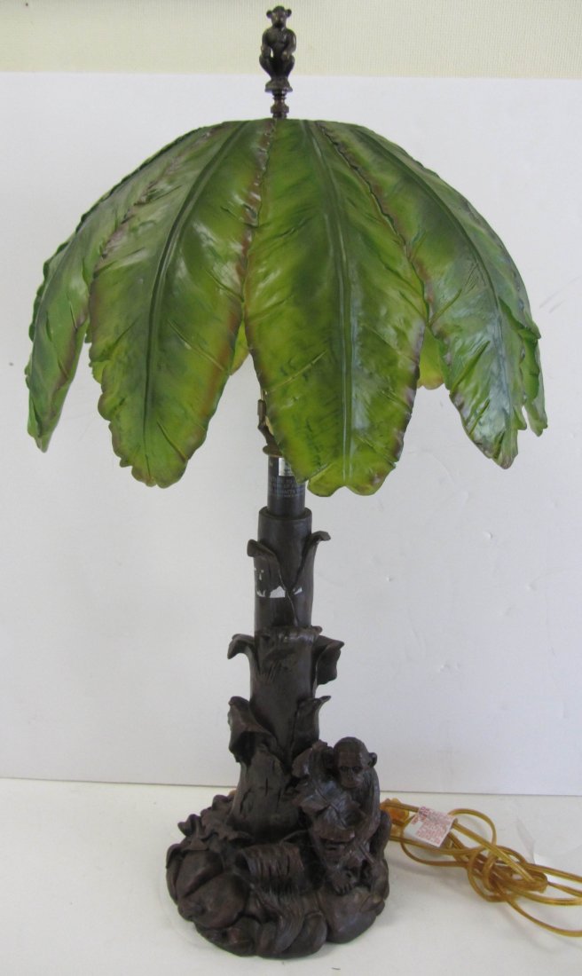 20th C. Monkey table lamp: 20th C. Monkey table lamp with original signed palm tree shade 30"h Auction Estimate 200-400