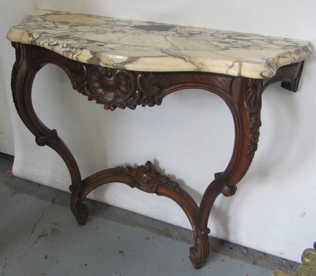 Walnut victorian marbletop pier table: 19th C. Detail carved walnut victorian marbletop pier table 34 x 37 Auction Estimate 300-600