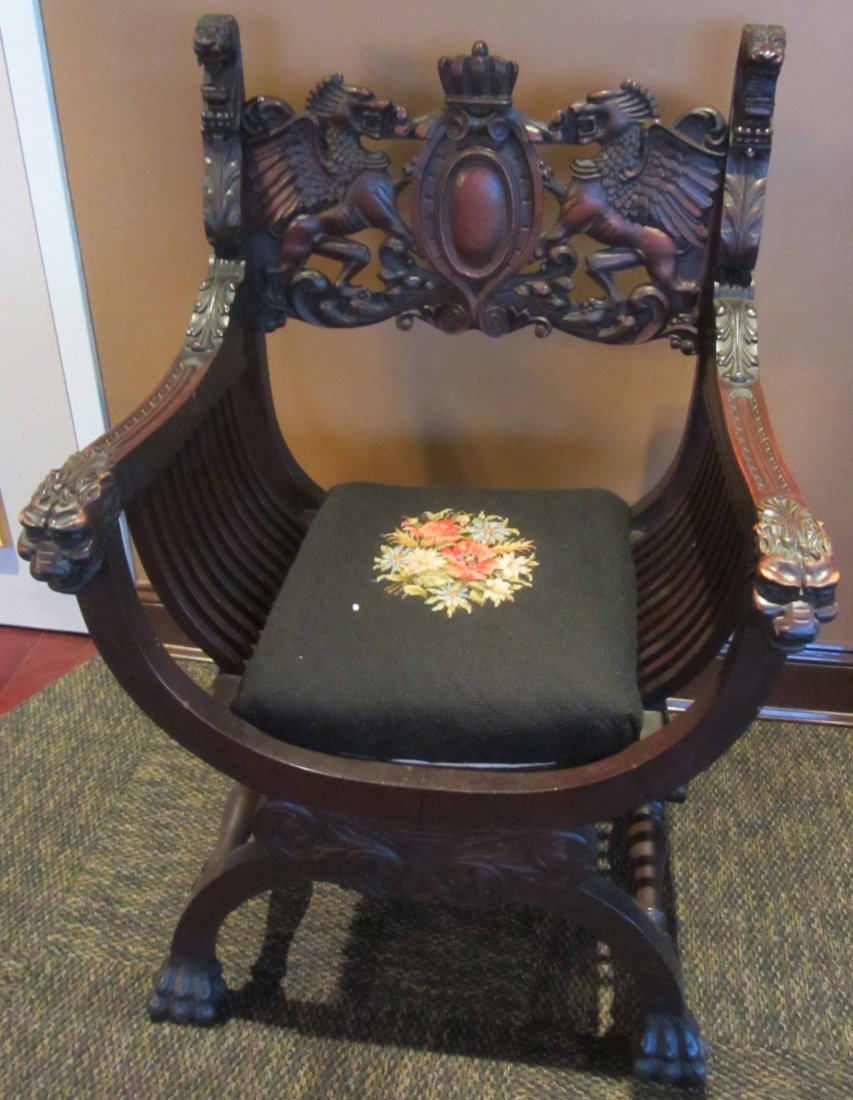 19th C. Carved Walnut Savonarola chair: 19th C. Carved Walnut Savonarola chair with winged griffins and needlepoint seat 40"h x 26 1/2"w Auction Estimate 450-900