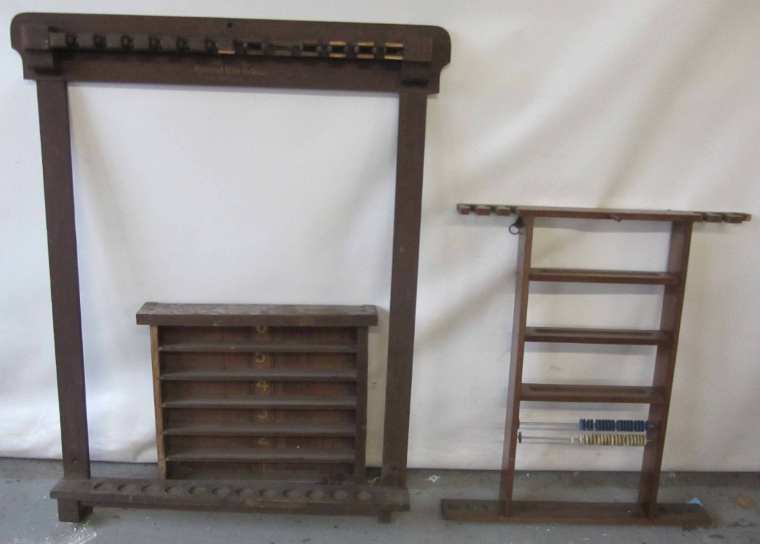 3 Pool room items: 3 Pool room items, ball rack, score keeper and pool cue holder Auction Estimate 100-300