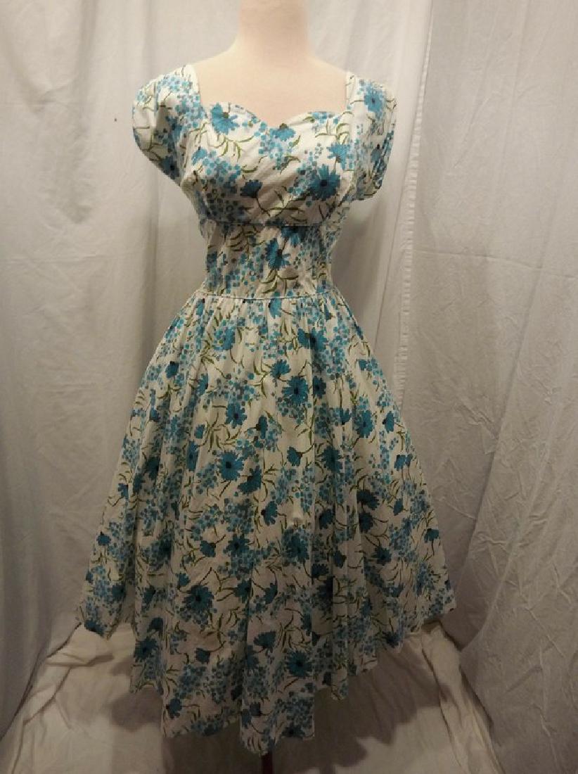 1950's Blue Floral Daisy Cotton Princess Dress by Sport: cap sleeves, fitted bodice with wide band at waist, gathered full skirt, V-back with back zipper, attached crinoline under skirt, approx. 38 bust, 28 waist