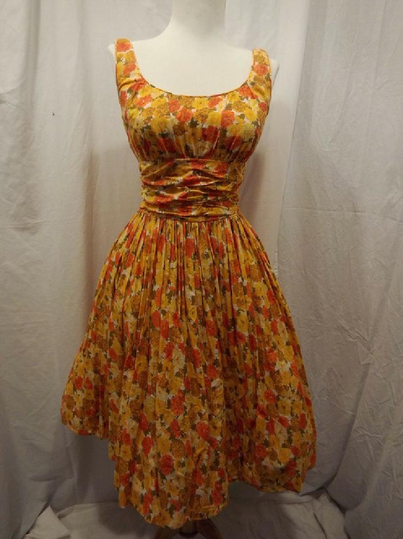 1950's Orange & Yellow Cotton Floral Party Pouf Dress: sleeveless tank top with scoop neck and gathered bodice wide gathered band at waist, full gathered skirt, back zipper, approx. 34 bust, 24 waist