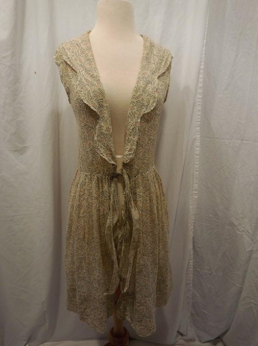1920's Printed Hankie Linen Ladies long Vest: sleeveless ties at gathered waist with ruffled edge shawl collar, knee length with 5 inch hem