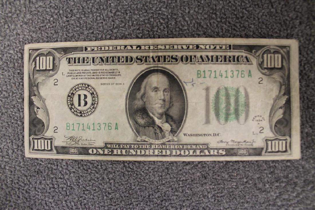 1934A 100 dollar bill: Serial number B17141376A, has been inked at some point. Printed by the bank of New York