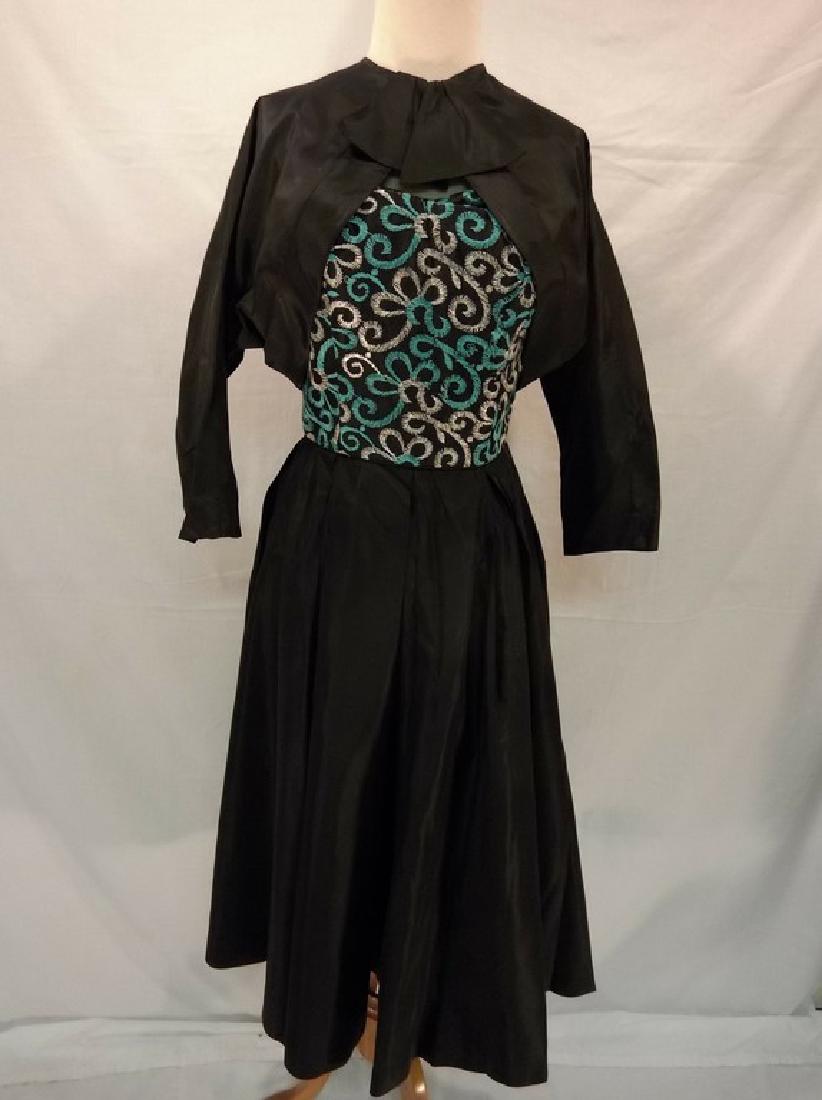 1950's Paul Sachs Ladies Vintage Cocktail Ensemble in: embroidered top with very full skirt and matching bolero jacket, excellent condition with a few minor pulls in embroidery, approx. 34/36 bust, 26 waist