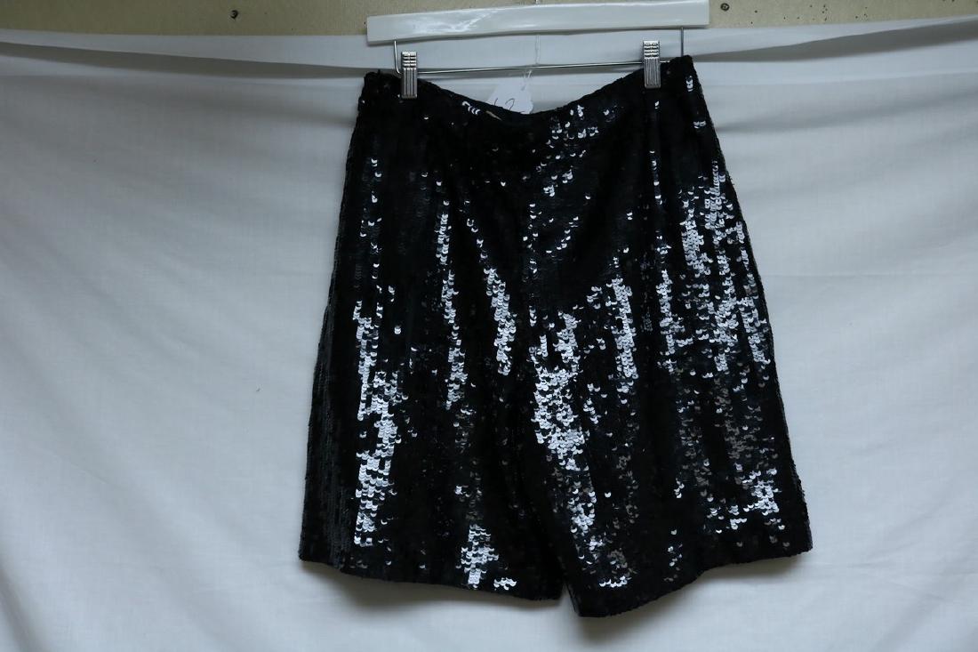 1980's Black Disco Sequin Shorts by Laurence Kazor: high waist, front zipper, pockets, a few lose sequin, approx. 30 waist, 42 hips, 8 inch inseam