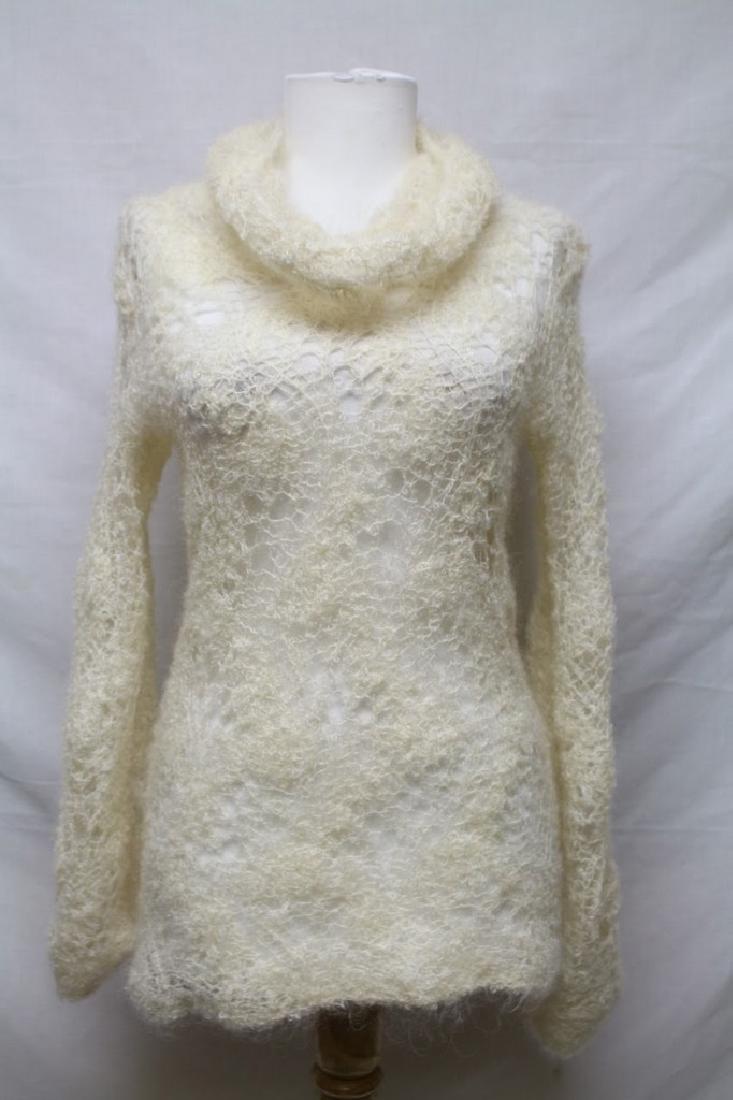1970s mohair crochet sweater: ivory spider web crochet mohair fabric, turtleneck, long sleeves. Excellent condition, no flaws to note. Bust 38/34 waist