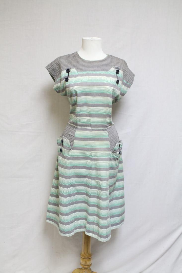 1940s Green Striped Dress: cotton fabric. Good condition - one light spot near hem, one repair near bust. See photos. 38 bust/31 waist