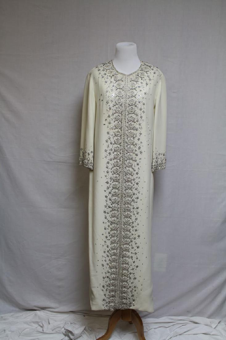 1960s Rhinestone Caftan: crepe fabric, heavy beading/rhinestones, fully lined. Good condition - some missing beading/stones. Light spotting. 40 bust/51 length