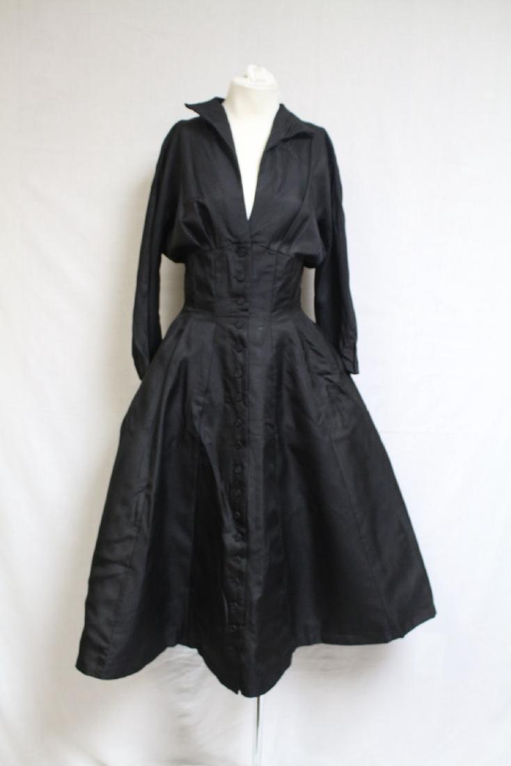 1950s Black Silk Dress: silk fabric. Good condition - one tiny pinhole and a few small repairs. 40 bust/30 waist