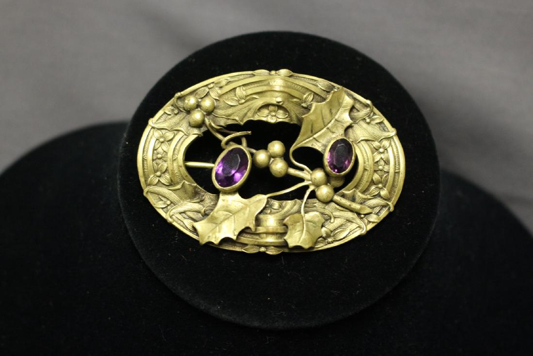 Edwardian Oval Brass Brooch: brass metal, purple glass stones. Great condition. 2.75"x2"
