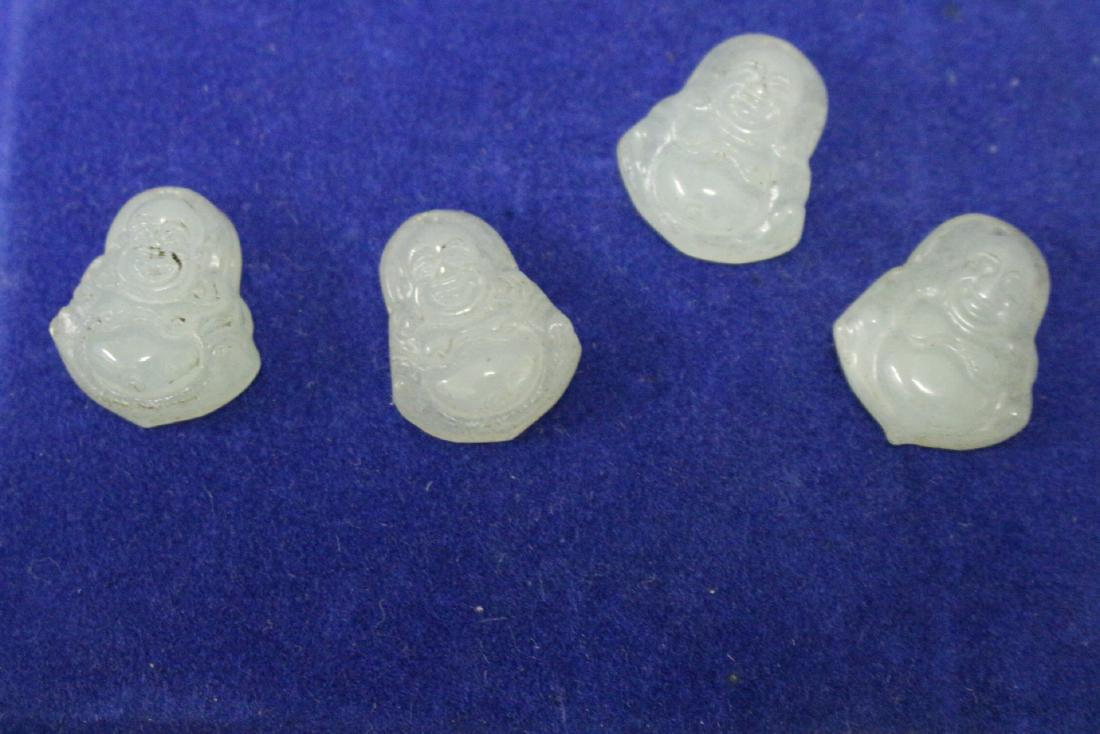 Set of Four Chinese Carved Buddah Pendants: light green in color, measure just over .50"