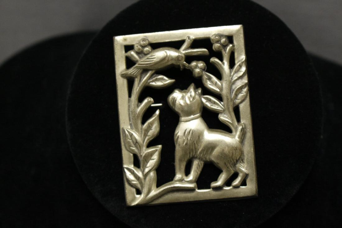 1940s Norseland by Coro Sterling Dog & Bird Brooch: sterling silver metal, measures 2.25" x 1.75"