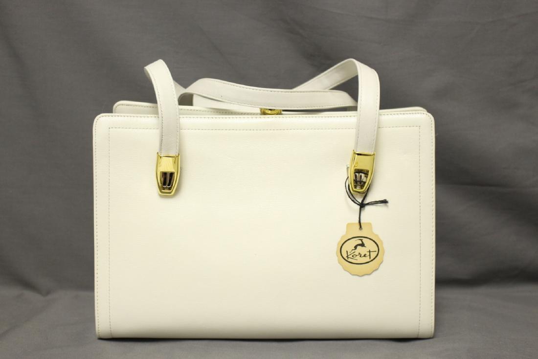 1960s Koret White Leather Purse: white leather, red leather inside, never used (original tag attached), gold tone hardware. Measures 11" x 7.5"