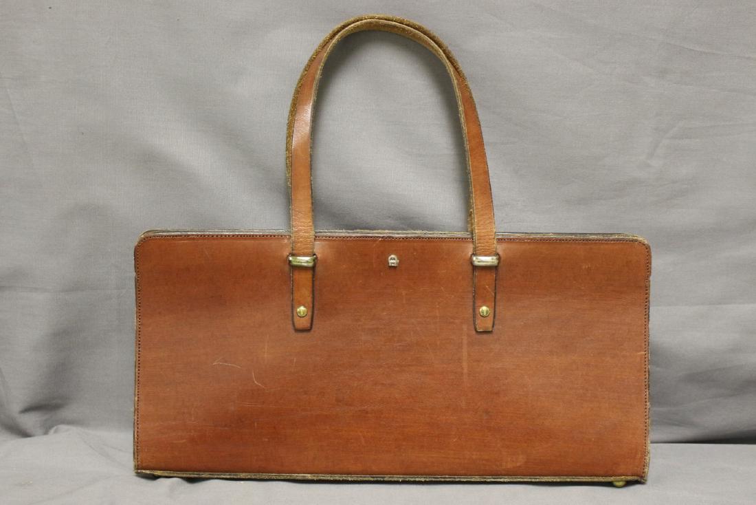 1970s Etienne Aigner Leather Handbag: brown leather with brass hardware/feet. Opens fishmouth style. Good condition - a few small scratches. 12.5" x 3" x 6"