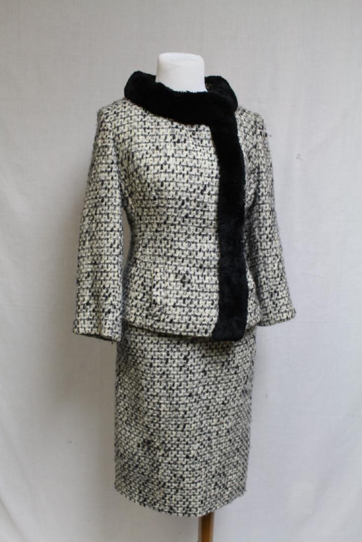 1960s Fur Trim Suit: Wool tweed fabric, sheered mink collar, and placket. Fully lined. 25" waist/ 36" bust.