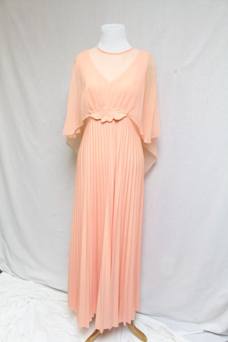 Vintage 1980s Peach Gown: polyester jersey and chiffon fabric, few very very faint spots on skirt, 36" bust/ 30" waist/ 57" length.