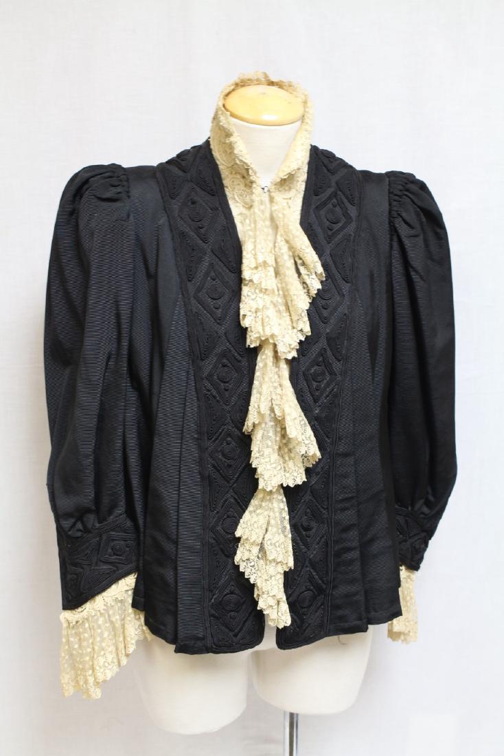 Edwardian Soutache and Lace Jacket: Silk taffeta fabric, lined with wool and silk. Silk lining has shattered. Cream lace along front plaquettes, heavy lace collar. Silk taffeta is in good condition, few undone darts at the back, trim on