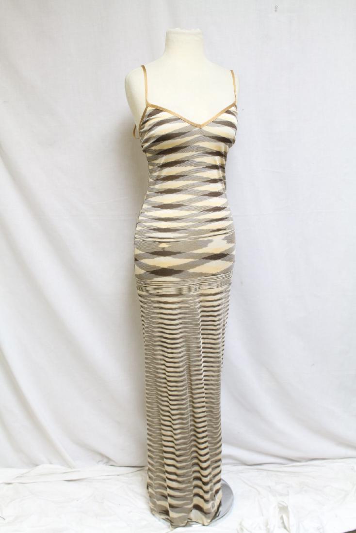 1970s Missoni Dress: Rayon knit fabric. Fair condition, small holes on bodice- see photos. 32" bust/64" length.