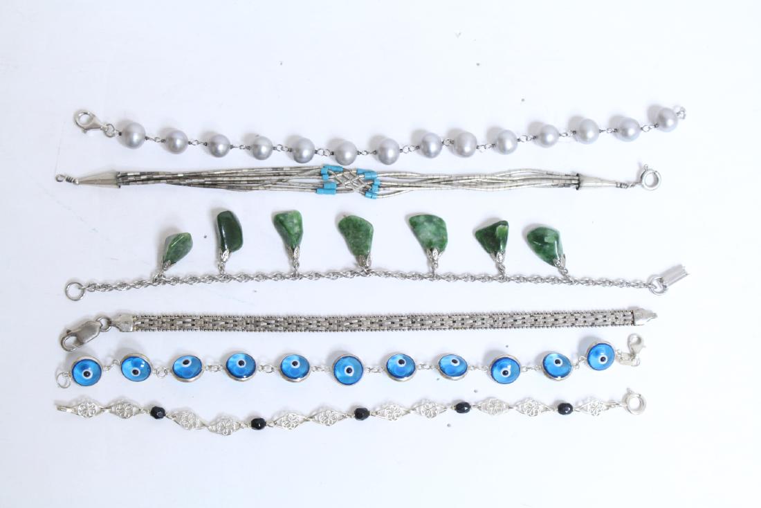 Lot of 6 Sterling and beaded Bracelets: lot of sterling with beads and stones