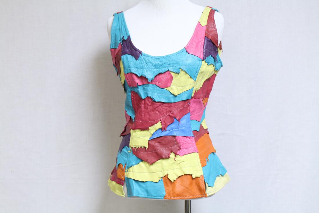 Vintage 1980s Leather Tank Top: leather fabric, good condition - snap at the upper back is damaged and a small mark near the bust, see photos. 36 bust/22 length