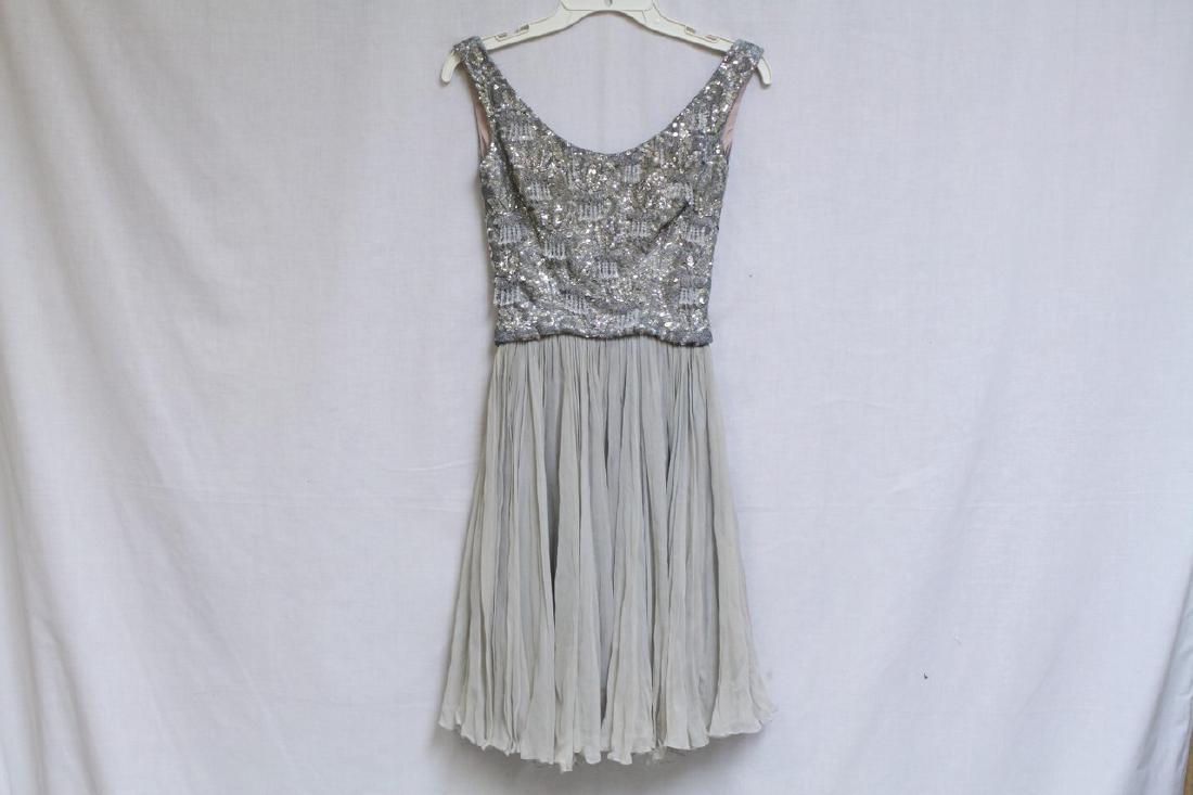 Vintage 1960s Lillie Rubin Beaded Chiffon Dress: silk chiffon, lame fabrics, fully lined. Good/Fair condition - chiffon is yellowed and has some light spots. See photos. 30 bust/22 waist