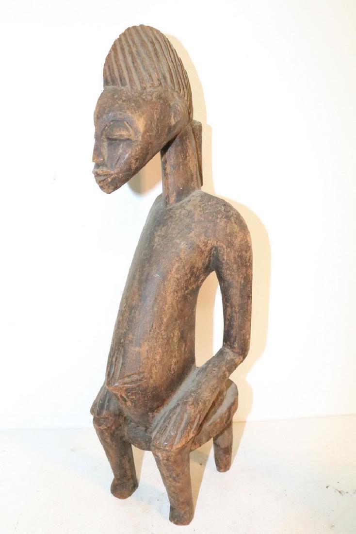 Hand Carved African Statue, seated Man (1 of 6)