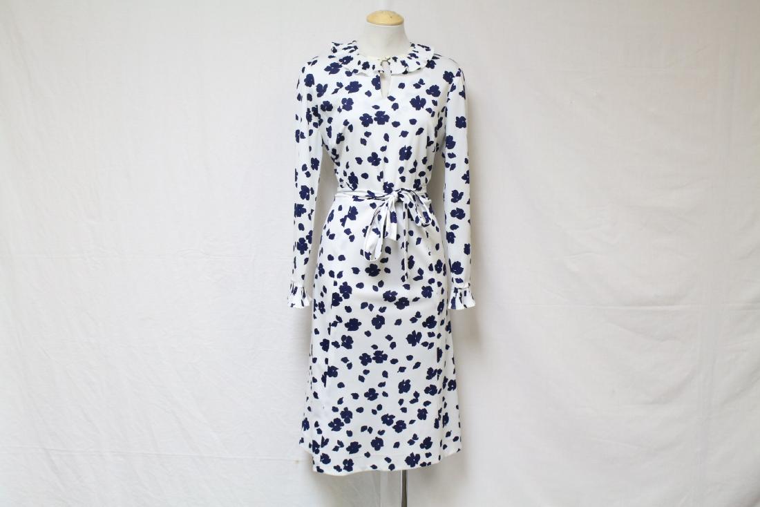 Vintage 1970s Blue & White Floral Dress: poly jersey fabric, fair condition with minor yellowing around the collar, a spot on the bust and an open seam under the arm, see photos. 40 bust/32 waist