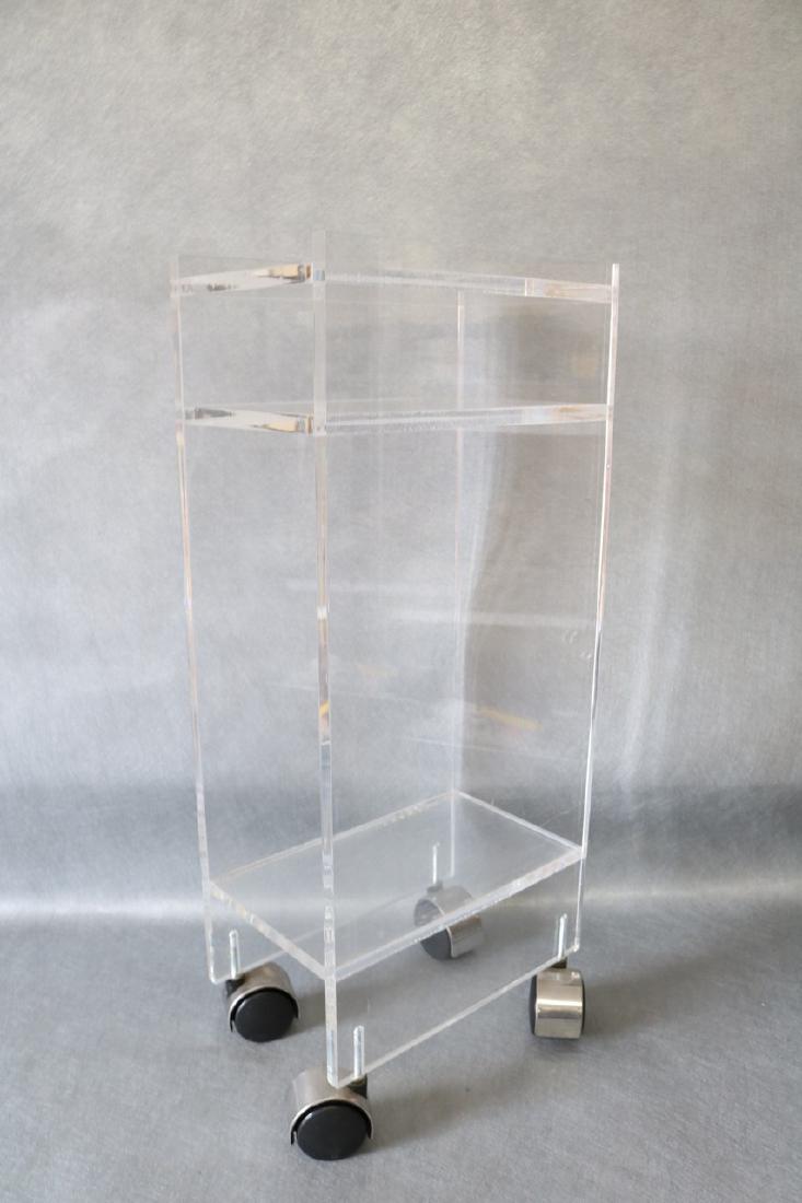 Vintage Lucite Rolling Stand/Table: Small stand with wheels, approx. 24 3/4 tall, 10 1/2 wide, 7 inches deep, good condition, some scratches